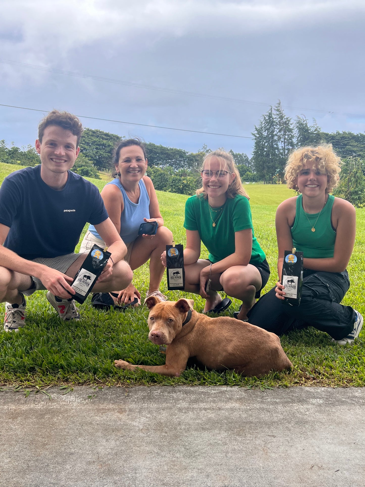 Farm tourists posing with doh